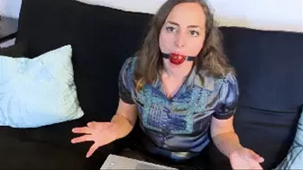 Karly Salinas' job is to get tied up and gagged in "GagMe Inc" a company that creates bondage products
