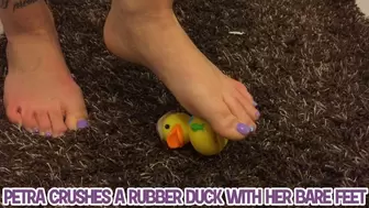 Petra crushes a rubber duck with her bare feet - Full HD