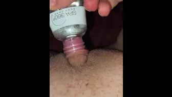 Horny and desperate slut uses a bottle to blow clit