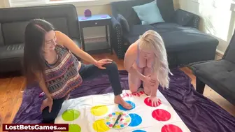 2 sexy lesbians are playing a strip twister game
